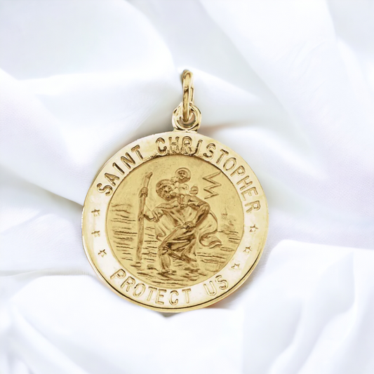 Gold St. Christopher medal pendant on a white background, evoking a sense of divine safeguarding