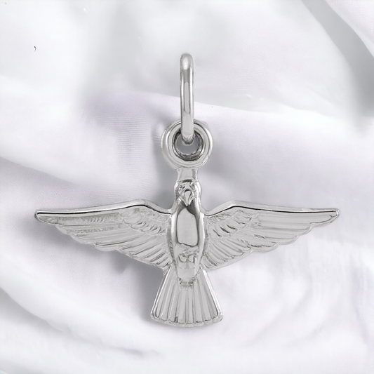 14K white gold dove pendant close-up, accentuating the smooth contours and artistic detail of the wings.