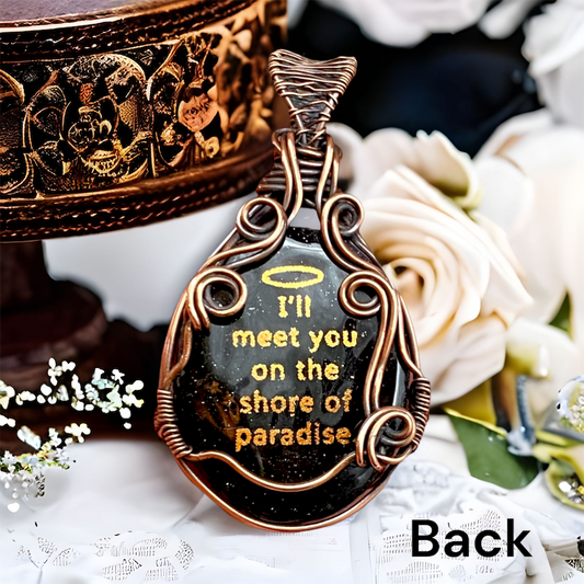 Copper quote on back: "I'll meet you on the shore of paradise." Abalone and jet doublet, oval shaped natural gemstone. Pure Copper setting in an artistic wave design. Copper seagull and palm tree design on front.