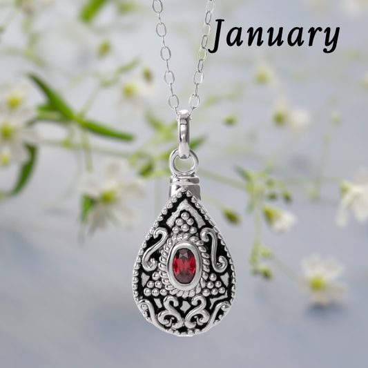 Red January birthstone teardrop ash necklace in Sterling Silver. 