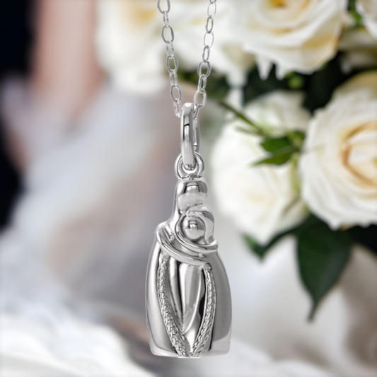 This sweet embrace style cremation ash necklace for women is the perfect keepsake to remember a loved one. A 3D shaped urn featuring 2 people embracing.  Sterling Silver urn pendant.