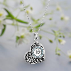This sweet baby hand cremation ash necklace for women is the perfect keepsake to remember a child who has departed. Sterling silver heart with your choice of blue or pink gemstones.