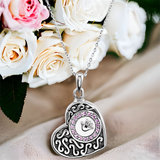This sweet baby hand cremation ash necklace for women is the perfect keepsake to remember a child who has departed. Sterling silver heart with your choice of blue or pink gemstones. 