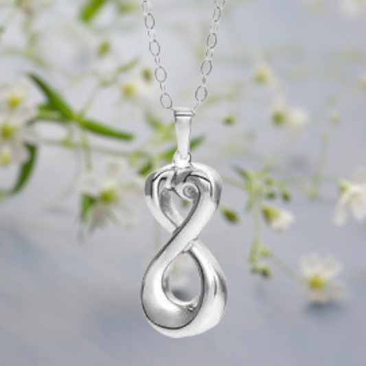 Infinity inspired cremation ash necklace in Sterling Silver.