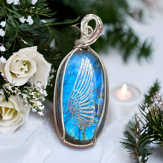 Beautiful Labradorite gemstone with flashes of blue set in a Sterling Silver necklace with an angel wing design, perfect for remembering a beloved mother.